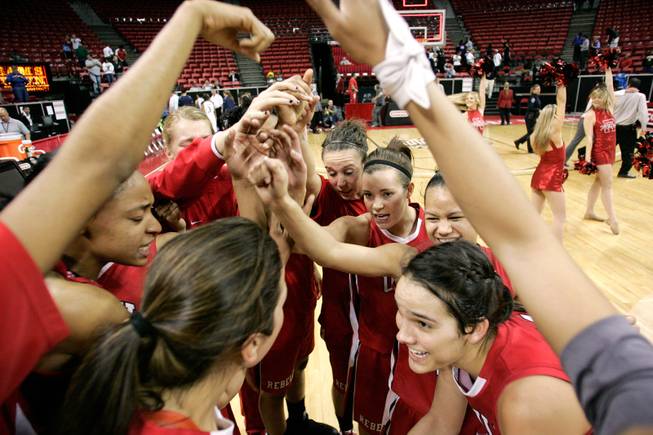 UNLV celebrates its 66-58 win against BYU in the first round of the Mountain West Championship at the Thomas & Mack Center in Las Vegas on Tuesday.