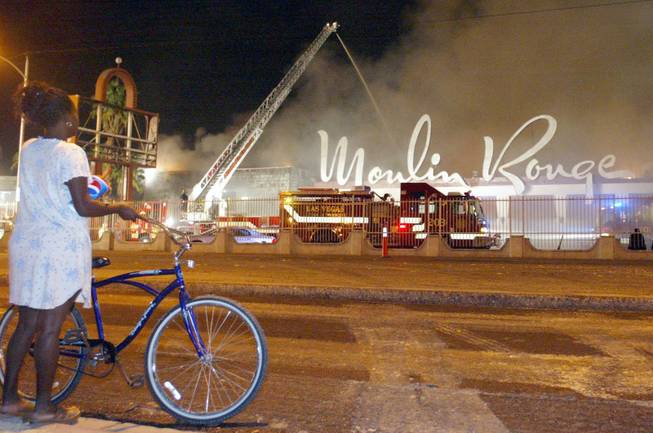 Donna Caver watches a fire at the Moulin Rouge at 900 W. Bonanza on Thursday, May 29, 2003. The three alarm fire gutted the historic structure which originally opened in 1955 and was the first interracial casino in Las Vegas. 