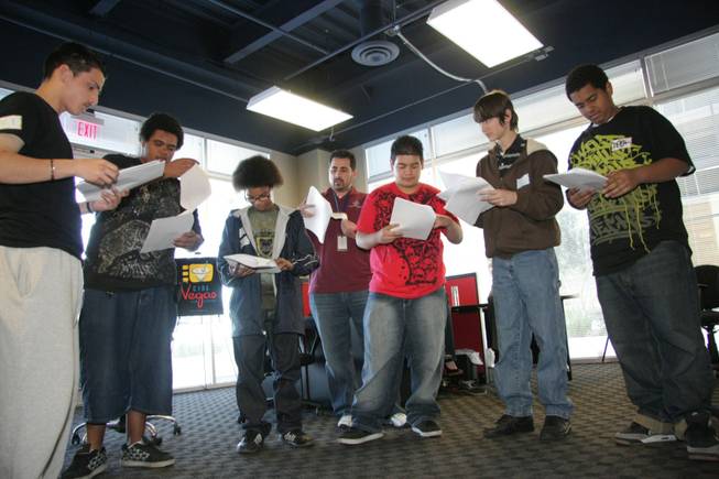 Students with the Boys and Girls Club go through their lines at the CineVegas offices. Seven local high school students are part of a film project that will take them to the red carpet of the CineVegas Film Festival this summer.