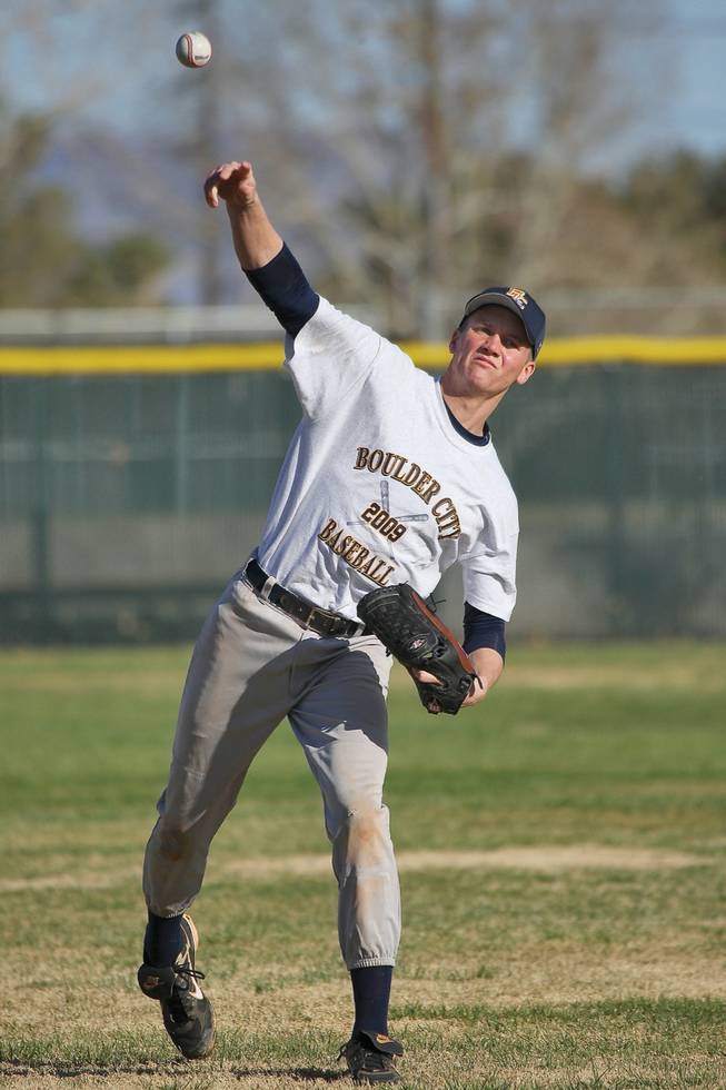 Boulder City outfielder Shane Levin throws home during outfield practice in preparation for the upcoming season.