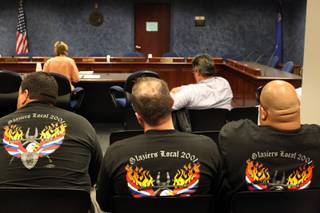 Union workers listen during a public forum on worker safety in Nevada during a Senate Committee on Commerce and Labor meeting at the Grant Sawyer Building in Las Vegas on Wednesday.