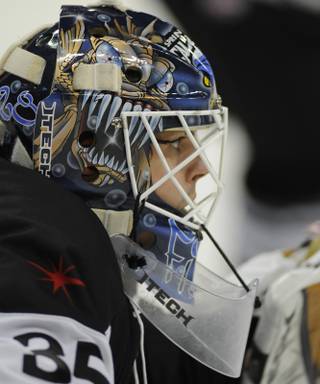 Las Vegas Wranglers goaltender Glenn Fisher closely watches a faceoff in his zone during the first period of play against the Phoenix Roadrunners at the Orleans Arena on Tuesday night. Fisher became the first Wranglers netminder to post back-to-back shutouts in franchise history with a 1-0 victory over the Roadrunners.