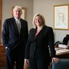 Edward Lubbers and Brooke Borg of Lubbers & Borg attorneys at law are shown in their Las Vegas office on Feb. 24. Susie the cat sits on the desk.