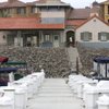 A passerby peers into the boathouse at the exclusive Southshore community at Lake Las Vegas.