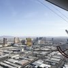 The M Lightship flies over the Las Vegas Strip.  The blimp has circled the Las Vegas Valley to advertise for the new M Resort on its 70-foot-by-30-foot video screen.