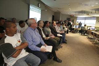 With standing room only, Pulte and Del Webb homeowners and members of the International Union of Painters listen to public comments regarding building defects and dissatisfaction Thursday during the Nevada State Contractors Board meeting.