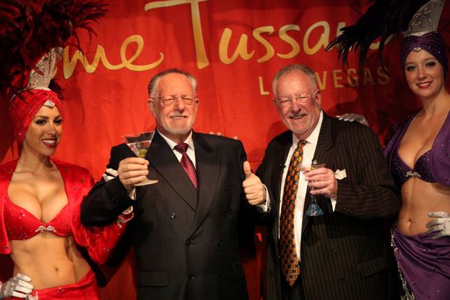 Mayor Oscar Goodman stands with Las Vegas Convention and Visitor Authority showgirls Jennifer Gagliano (left) and Jennifer Speelman as Madame Tussauds unveils the newest addition to their collection Thursday. The life-size wax figure of Oscar Goodman was introduced as the museum opens its newest exhibit, Viva Las Vegas.


