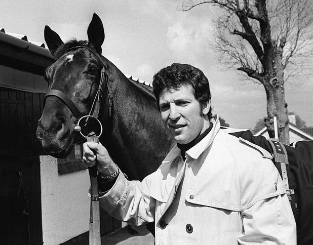 British singer Tom Jones attends to his racehorse 