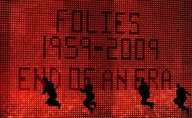 Performers dance during the final performance of Folies Bergere at the Tiffany Theatre inside the Tropicana in Las Vegas Saturday.