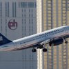 Leaving Las Vegas: A US Airways jet takes off from McCarran International Airport on March 27. 