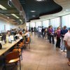People wait in line near unstaffed stations at the Department of Motor Vehicles office in Henderson in 2009.