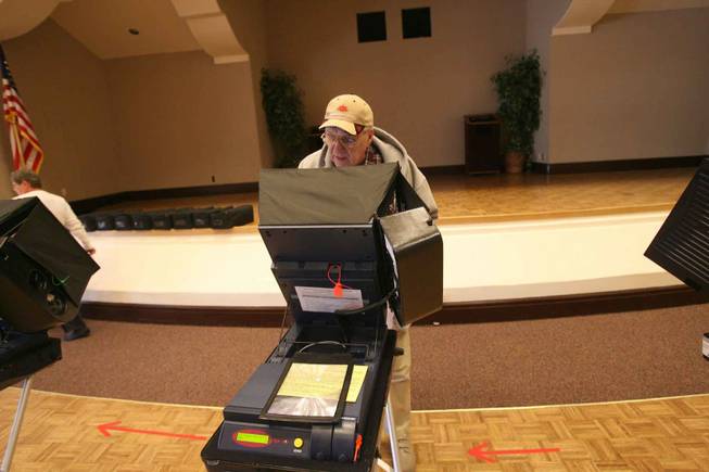 Sun City Summerlin resident Michael Sansone votes in Tuesday's municipal primary election at the Desert Vista Community Center.