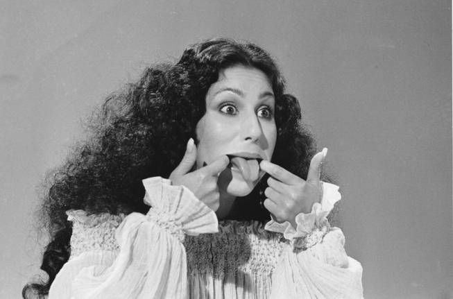 Entertainer Cher sticks her tongue out during taping of a ...