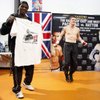 Floyd Mayweather Sr., left, trainer for light welterweight boxer Ricky Hatton of England, holds up a T-shirt as Hatton jumps rope during a media workout in Las Vegas, Nevada Thursday, April 16, 2009. The T-shirt was part of a gag gift given by rival trainer Freddie Roach.