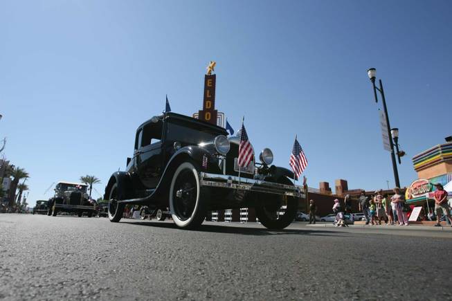 A Model A car cruises along during Henderson's annual Heritage Parade
On Water Street.