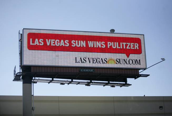A billboard along Interstate 215 near the McCarran International Airport exit displays a message announcing the Sun's Pulitzer Prize win on Monday. 