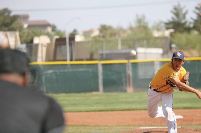 Boulder City High's Adam Eudy throws a pitch during a home game against Moapa Valley on April 24.