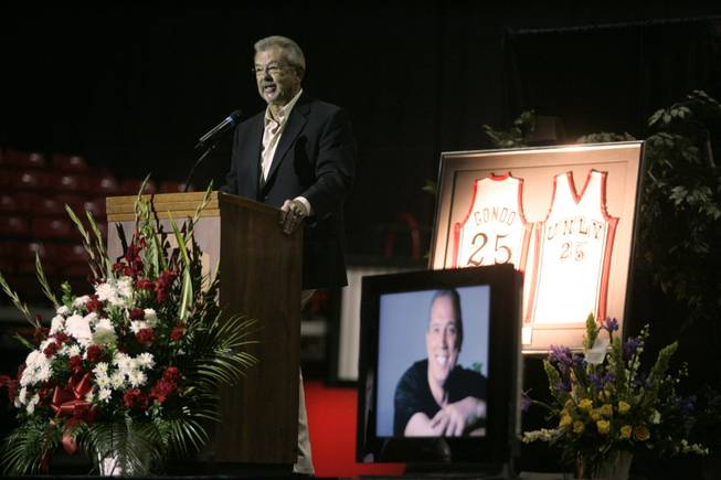 UNLV announcer Dick Calvert speaks at a memorial for Glen "Gondo" Gondrezick Thursday, April 30, 2009 at the Thomas & Mack. Gondo, a 17-year radio and television analyst for UNLV, was a member of UNLV's first Final Four team and a veteran of six seasons in the NBA. He died Monday from complications of a heart transplant. 