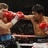 Manny Pacquiao, right, punches at Ricky Hatton during their junior welterweight fight at the MGM Grand Garden Arena in Las Vegas, on May 2, 2009.
