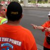 Carol Contreraz joins other construction workers from the Laborers International Union of North America in protest Tuesday in front of the Renaissance Las Vegas Hotel during Pinnacle Entertainment's annual shareholder meeting.