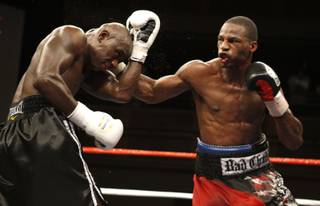 Chad Dawson finds an opening against Antonio Tarver in their IBF/IBO light heavyweight title fight Saturday night at the Hard Rock Hotel & Casino.