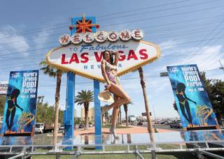 The Las Vegas Convention and Visitors Authority, Las Vegas Mayor Oscar Goodman, Holly Madison, and about 300 bikini-clad women declare it the first day of summer with a world record-breaking parade  Thursday.