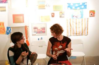 Kiva Singh, left, and Becky Bosshart talk and work on their textile projects during a Bouse House textile workshop organized by artist Danielle Kelly to coincide with her exhibit at Henri & Odette Gallery in Las Vegas on Thursday, May 14, 2009.