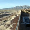 The vacant desert at left was to be developed as Park Highlands, a 2,675 acre community in North Las Vegas. Work began in 2007 with the expectation that people would begin moving in in 2008. This February, the projection for completion of the first homes was moved to 2010. Now, who knows?