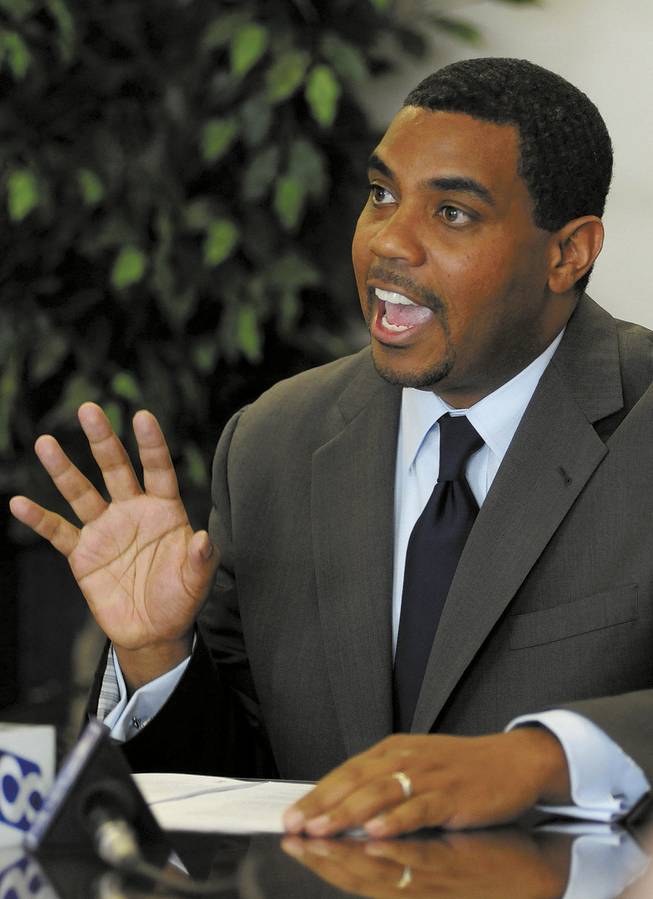 Senate Majority Leader Steven Horsford talks to the media Wednesday in Carson City about the next state budget. Like nearly everyone in the Legislature, Horford has outside work -- as CEO of two companies.