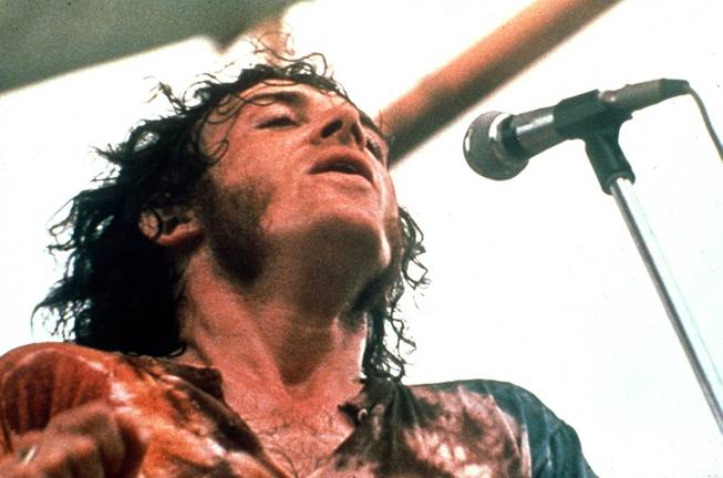 Joe Cocker performs at the Woodstock Festival of Arts and Music in Bethel, New York, August 1969. Cocker turned 65 on Wednesday, May 20, 2009. 