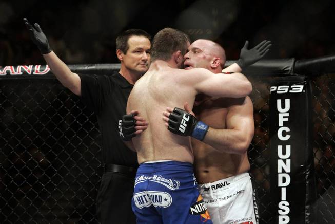 Matt Hughes, left, and Matt Serra hug after their welterweight bout at UFC 98 at MGM Grand Garden Arena in Las Vegas on Saturday, May 23, 2009. Hughes won the grudge match by unanimous decision.