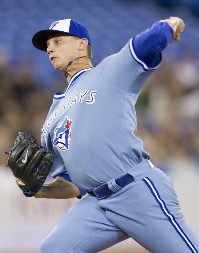 Toronto Blue Jays starting pitcher Brett Cecil works against the Chicago White Sox during the first inning of a baseball game in Toronto on Friday, May 15, 2009.