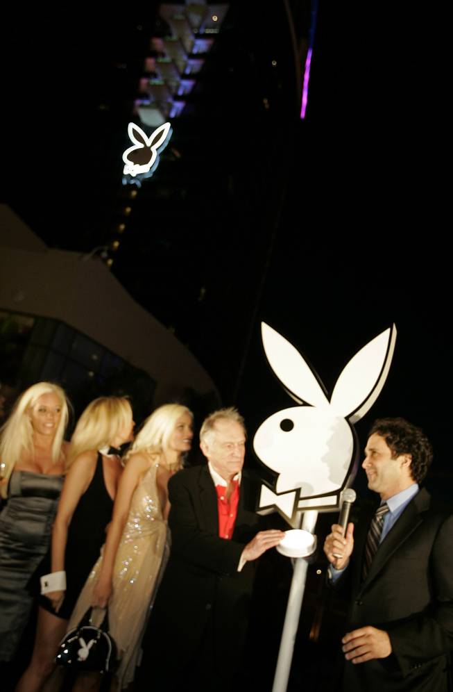 Playboy founder Hugh Hefner and Palms owner George Maloof during a 2006 ceremony to light the Playboy Rabbit Head on the side of the Palms' Fantasy tower marking the grand opening of the first Playboy Club in over 20 years.