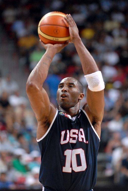 Kobe Bryant of the Los Angeles Lakers takes a shot while playing for Team USA.