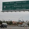 The Nevada Department of Transportation has rephrased the sign at the intersection of Buchanan Boulevard and Nevada Way to let tourists know that there are two routes to Hoover Dam. The new sign went up June 3.