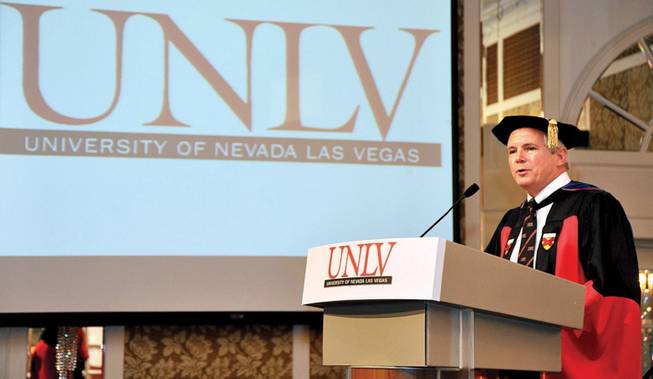 
UNLV President David Ashley speaks Saturday during graduation ceremonies at UNLV's satellite campus in Singapore. Ashley conferred 34 bachelor's degrees and seven master's degrees. Some in the university community were uncomfortable with Ashley making the trip.