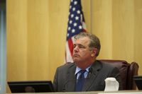 Councilman Jack Clark listens to people speak about an agenda item Tuesday, June 9, 2009, during his final City Council meeting.