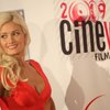 "The Girls Next Door" reality television star Holly Madison was among those who walked the red carpet  at the CineVegas film festival's premiere of "Saint John of Las Vegas" Wednesday night at Planet Hollywood in Las Vegas. 