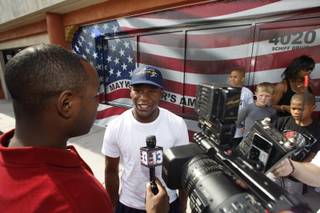 Boxer Floyd Mayweather Jr. talks to reporters outside his gym Thursday, June 11, 2009.  Mayweather is coming out of retirement to fight Juan Manuel Marquez on July 18.
