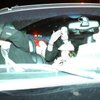 Michael Jackson blows kisses to fans from inside a vehicle just outside of Green Valley Ranch on Nov. 20, 2003. Jackson left Las Vegas on that morning and flew to Santa Barbara, Calif., to turn himself in to authorities on charges of child molestation. He landed at the Henderson Executive Airport that afternoon and drove around Las Vegas and Henderson in a black sport utility vehicle for more than two hours.