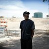 Saul Willis stands on the portion of F Street near his home at McWilliams Avenue that was closed in September to make way for the Interstate 15 widening project.