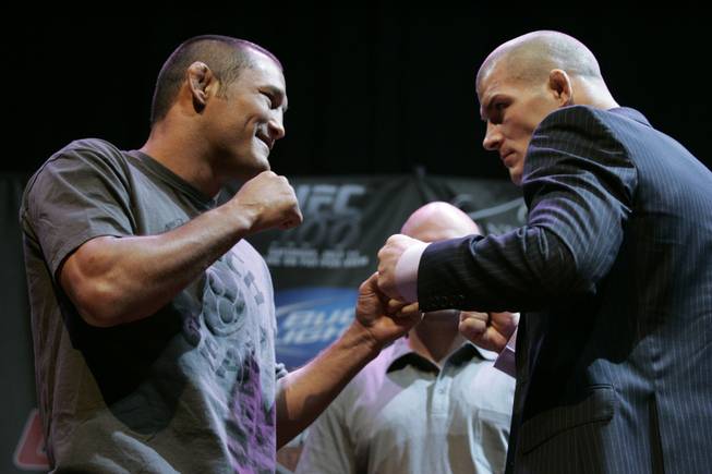 Dan Henderson, left, and Michael Bisping square off at a news conference for UFC 100 at Mandalay Bay Thursday, July 9, 2009. UFC 100 takes place Saturday, July 11th at the Mandalay Bay Events Center. 