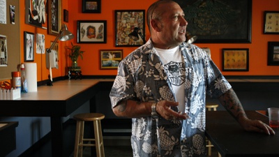 Eminent visitor swoops in on ink school 