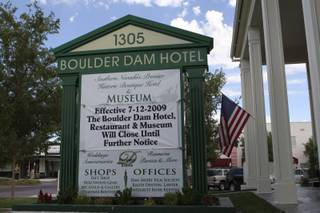 A closing banner hangs in front of the Boulder Dam Hotel.