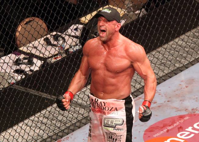 Mark Coleman celebrates his victory over Stephan Bonnar after their fight at UFC 100 at Mandalay Bay on Saturday, July 11, 2009.