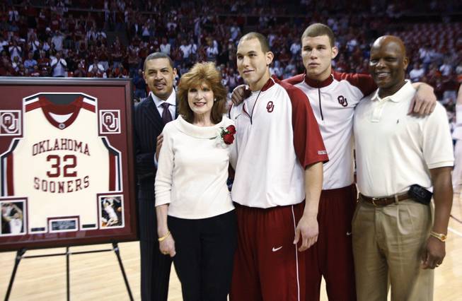 From left, Oklahoma coach Jeff Capel, Gail Griffin, Taylor Griffin, Blake Griffin and Tommy Griffin pose for a photo during senior ceremonies in Norman, Okla., on March 7, 2009. Blake, the No. 1 overall pick by the Los Angeles Clippers in last month's NBA Draft, and Taylor, a second round choice of the Phoenix Suns, are both playing in the NBA summer league this week in Las Vegas. The two have different goals in mind, however.