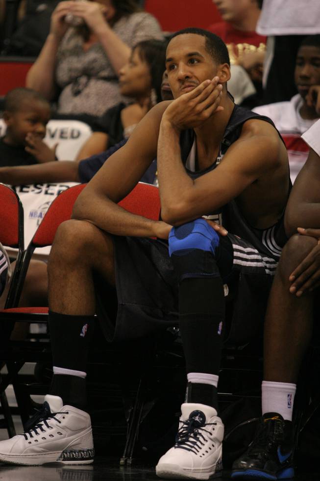Oklahoma City Thunder guard Shaun Livingston takes a moment on the bench in the closing moments of an 86-57 loss on Sunday at Cox Pavilion in NBA summer league play. Livingston is now just over two years removed from a nasty injury to his left knee which temporarily de-railed a promising NBA career. He signed a multi-year deal with the Thunder mid-way through the 2008-09 campaign.