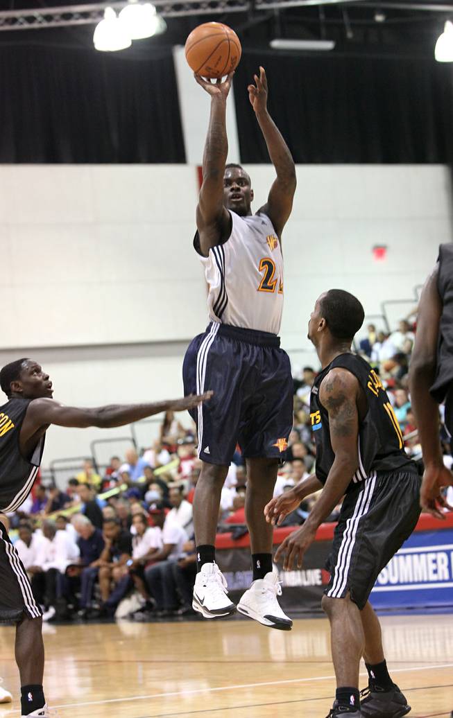 Warriors guard Anthony Morrow hoists one of his 9 3-point attempts Thursday in an NBA summer league contest against New Orleans at Cox Pavilion. Morrow connected on 7 of them en route to scoring a summer league record 47 points in the victory. A year ago, he came to the summer league with New Orleans as a relative unknown and went on to lead the NBA in 3-point field goal percentage last season.