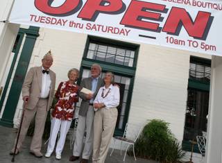 The Boulder Dam Hotel, which closed for lack of funds on July 11, will reopen after receiving a donation of $260,000 on Monday from an anonymous donor. From left: attorney Ralph Denton, gift shop manager Marie Sullivan, Darryl Martin, president of the Boulder City Museum and Historical Association, and his wife, Sara Denton, a founding member of the Boulder City Museum and Historical Association. 