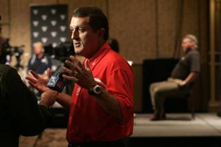 UNLV head football coach Mike Sanford speaks to the media during the Mountain West Conference Media Day on July 21, 2009.